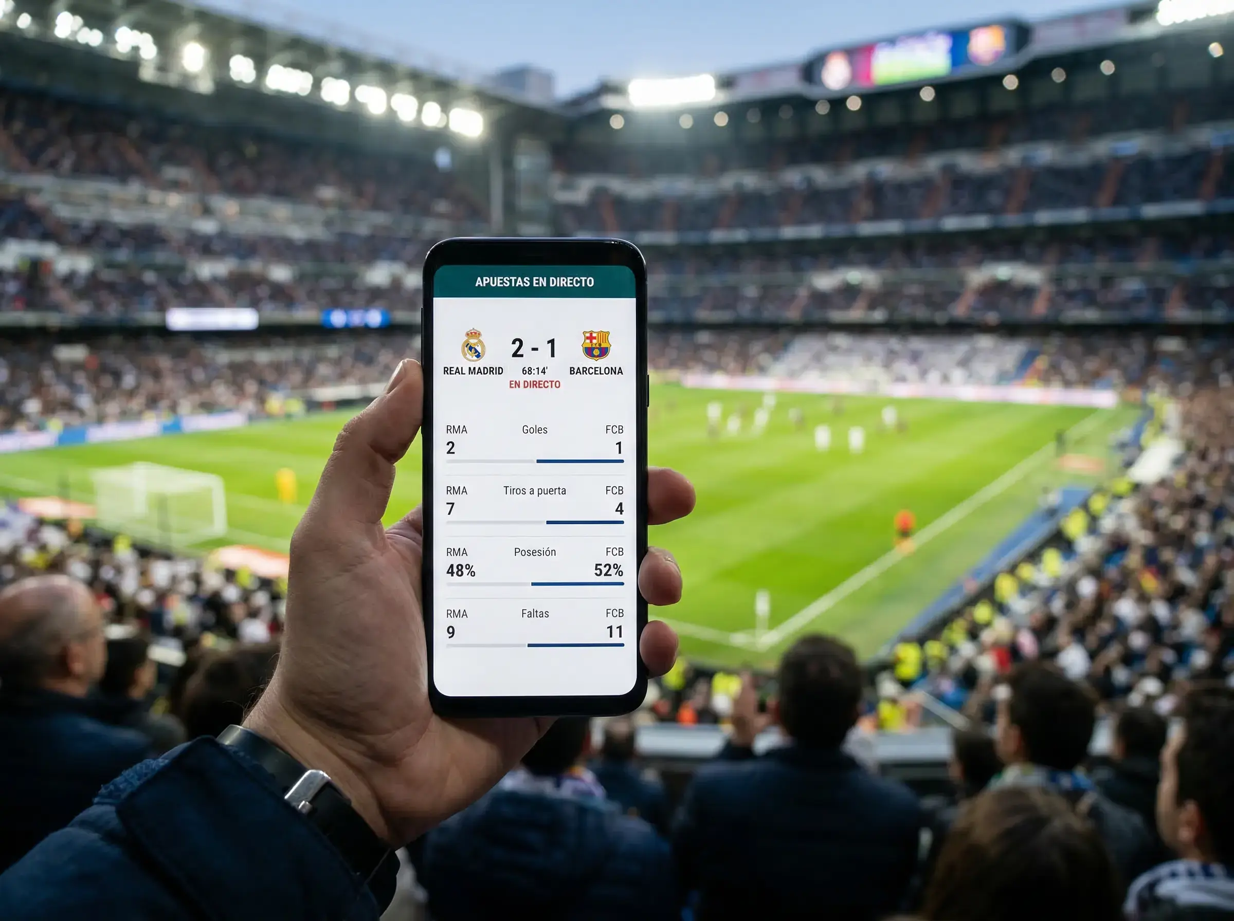 Pantalla de móvil mostrando datos en tiempo real durante un partido de fútbol en un estadio